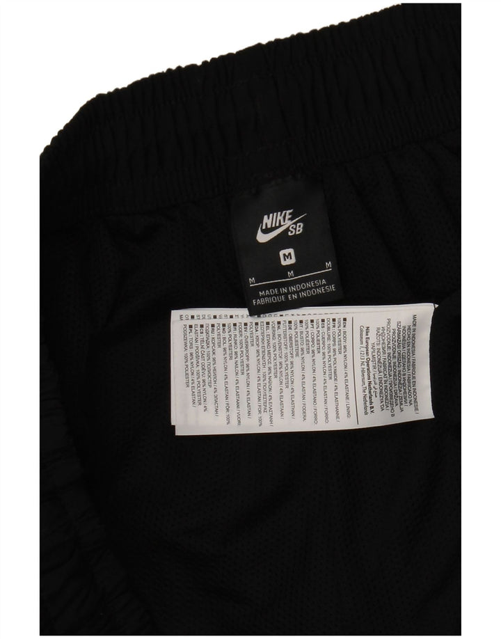 Nike Pantalon de survêtement pour homme en nylon noir moyen