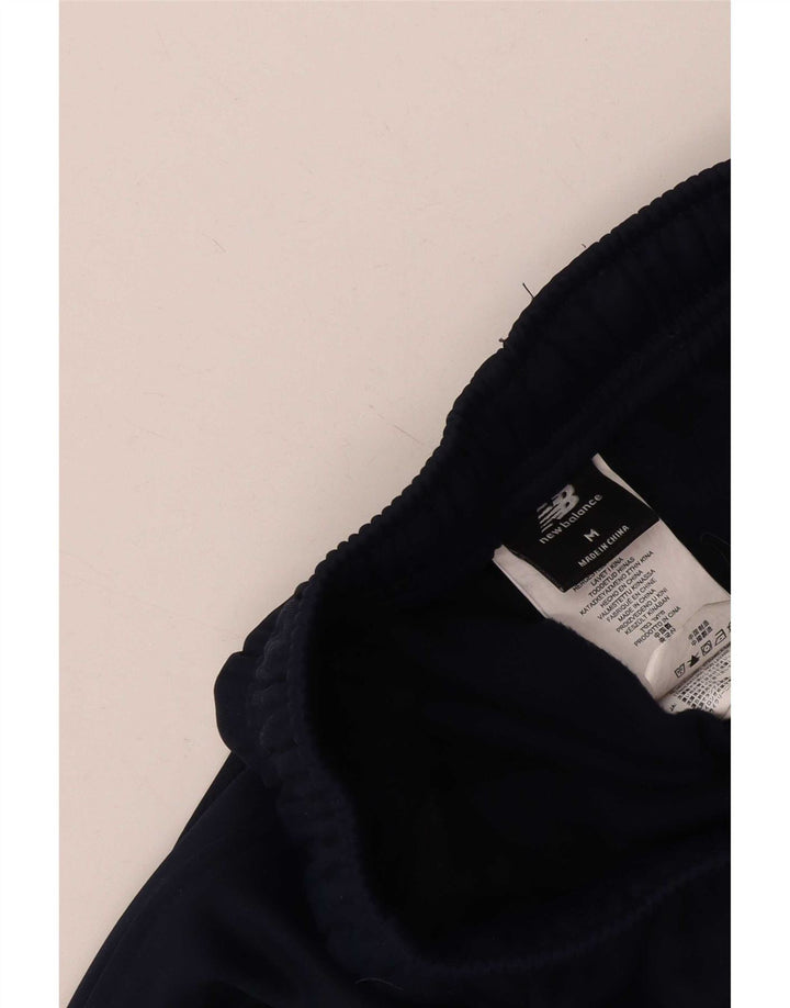 New Balance Pantalon de Survêtement Graphique Homme Bleu Marine Moyen Polyester