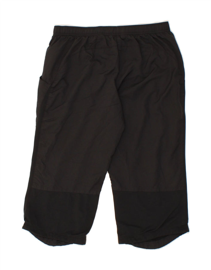 NIKE Womens Capri Tracksuit Trousers UK 10 Small Black Polyester Vintage Nike and Second-Hand Nike from Messina Hembry 