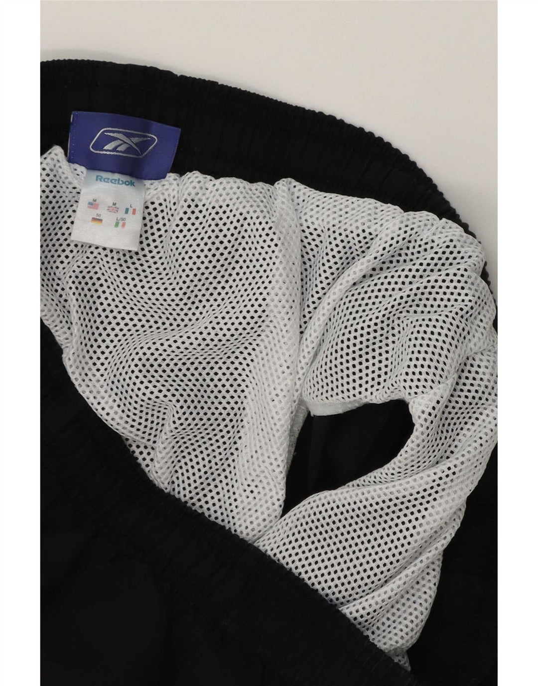 Reebok Short de Sport Homme Noir Moyen Polyester