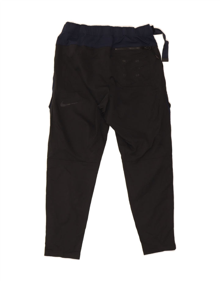 NIKE Pantalon cargo fuselé pour homme Medium W32 L27 Noir Colourblock