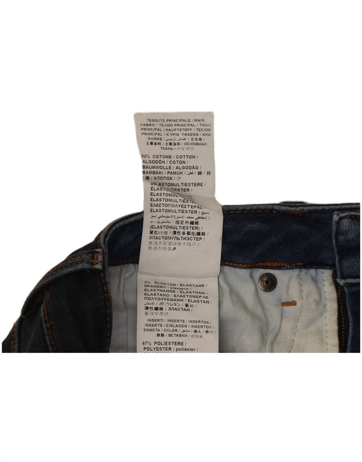 Moschino Jean skinny femme W26 L31 bleu marine patchwork coton