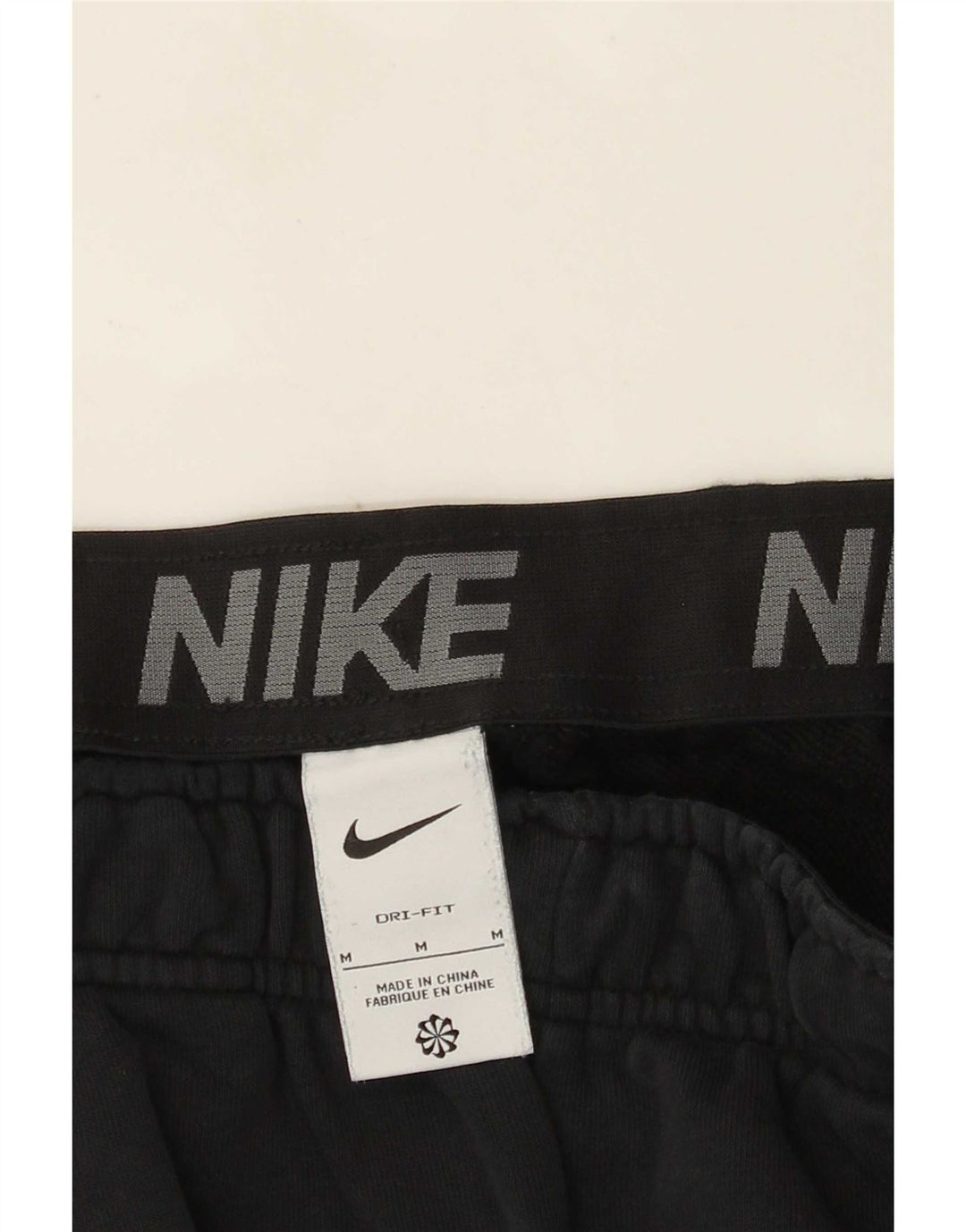Pantalon de survêtement Nike Dri Fit Graphic pour homme, noir moyen