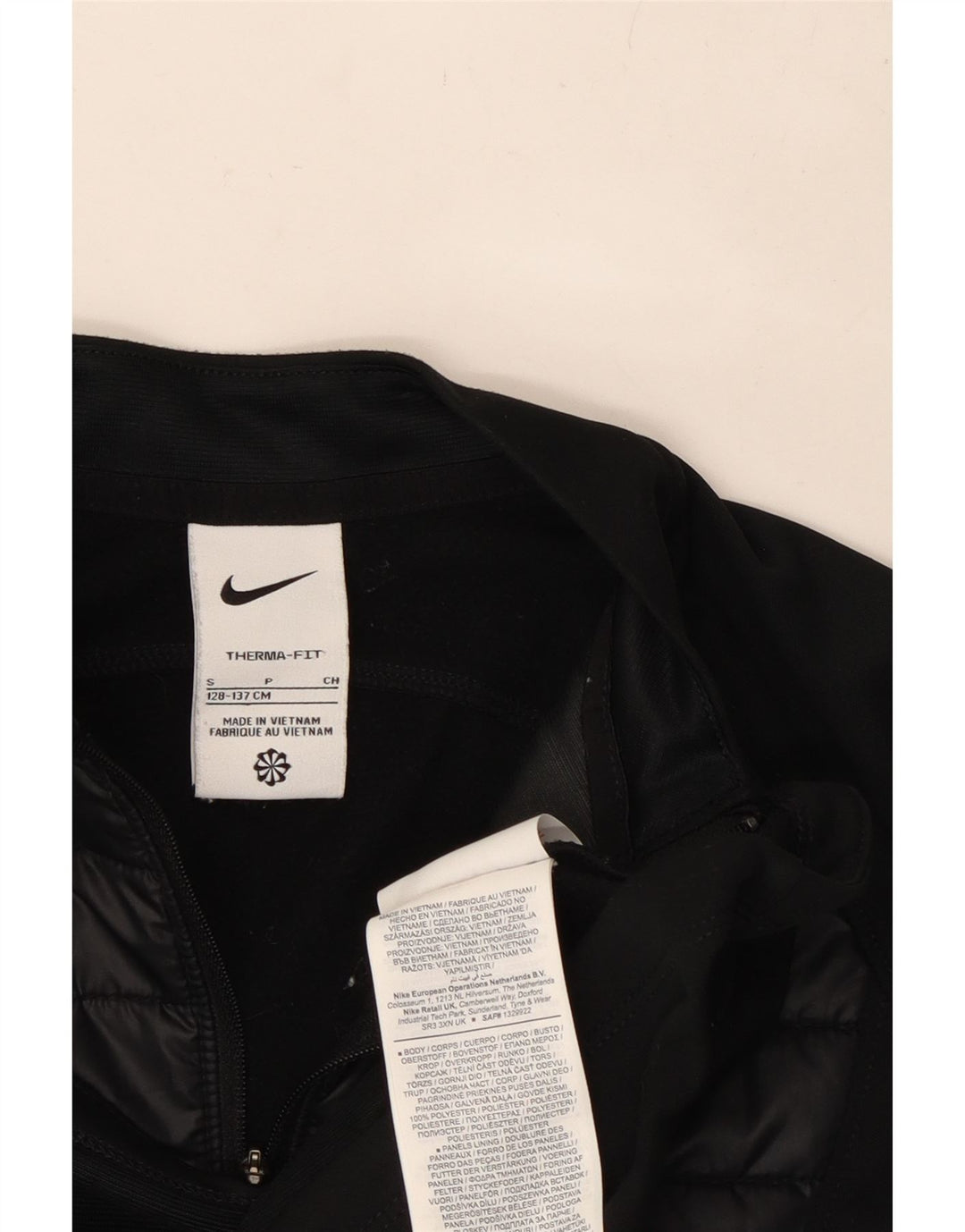 NIKE Boys Therma-Fit Zip Neck Pullover Tracksuit Top 8-9 Years Small Black Vintage Nike and Second-Hand Nike from Messina Hembry 