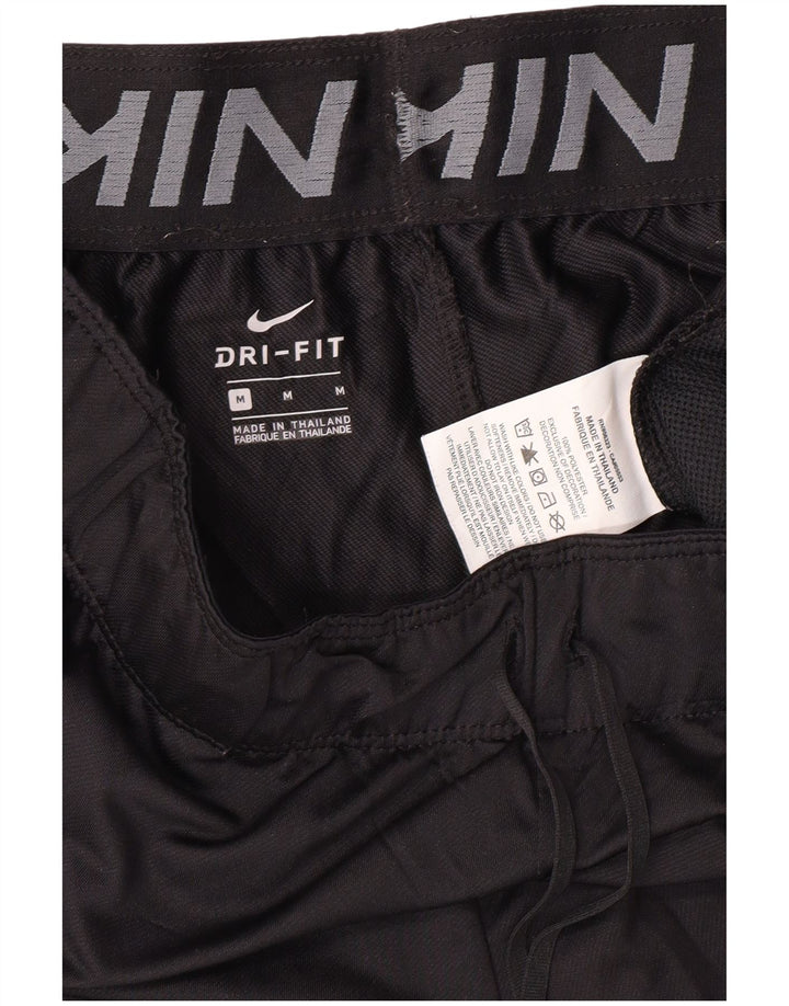 NIKE Short de sport Dri Fit pour femme UK 14 Noir moyen Polyester