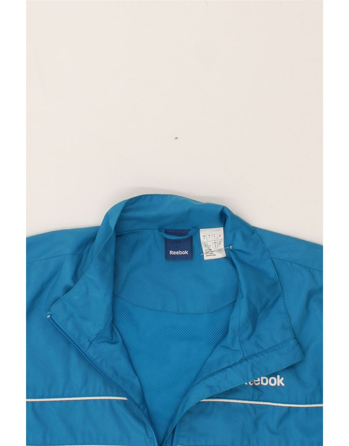 REEBOK Boys Tracksuit Top Jacket 14-15 Years Small Blue Polyester Vintage Reebok and Second-Hand Reebok from Messina Hembry 