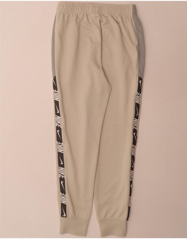 Nike Pantalon de survêtement graphique pour homme XS Beige Colorblock Polyester