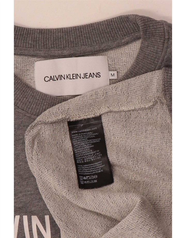 Calvin Klein Jeans Sweat-Shirt Graphique Homme Gris Moyen Moucheté