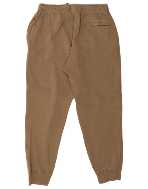 Nike Pantalon de survêtement graphique en coton beige moyen pour homme