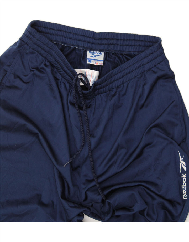 REEBOK Mens Tracksuit Trousers Large  Navy Blue Polyester Vintage Reebok and Second-Hand Reebok from Messina Hembry 