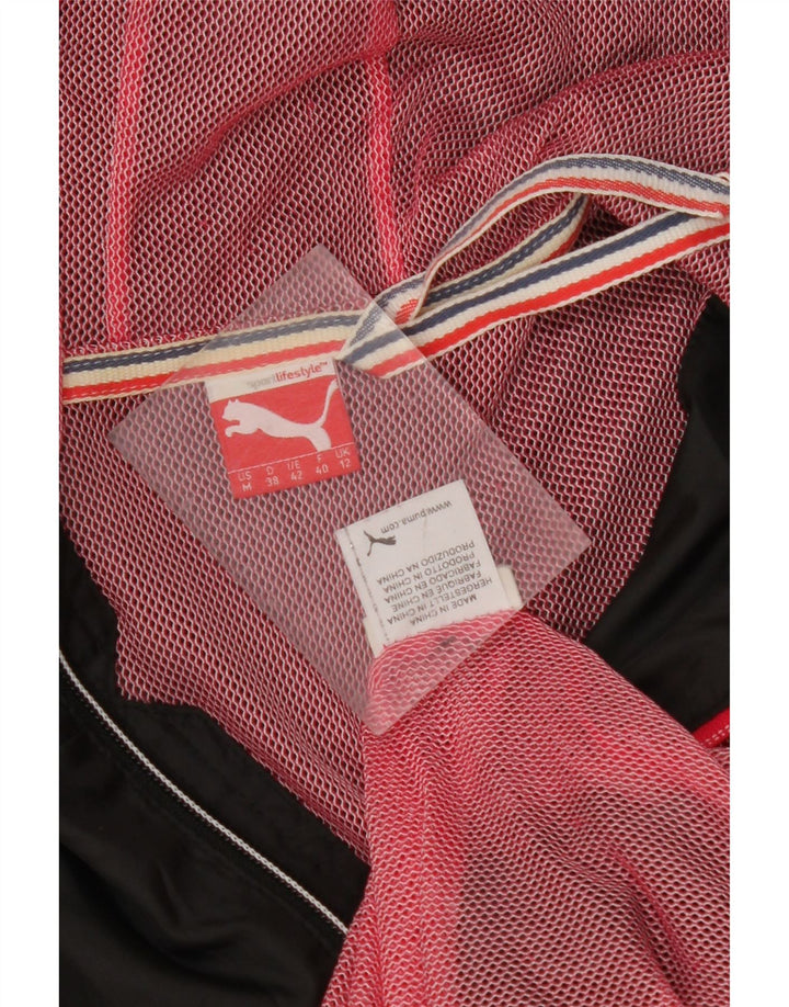 PUMA Veste de pluie à capuche pour femme UK 12 Medium Noir