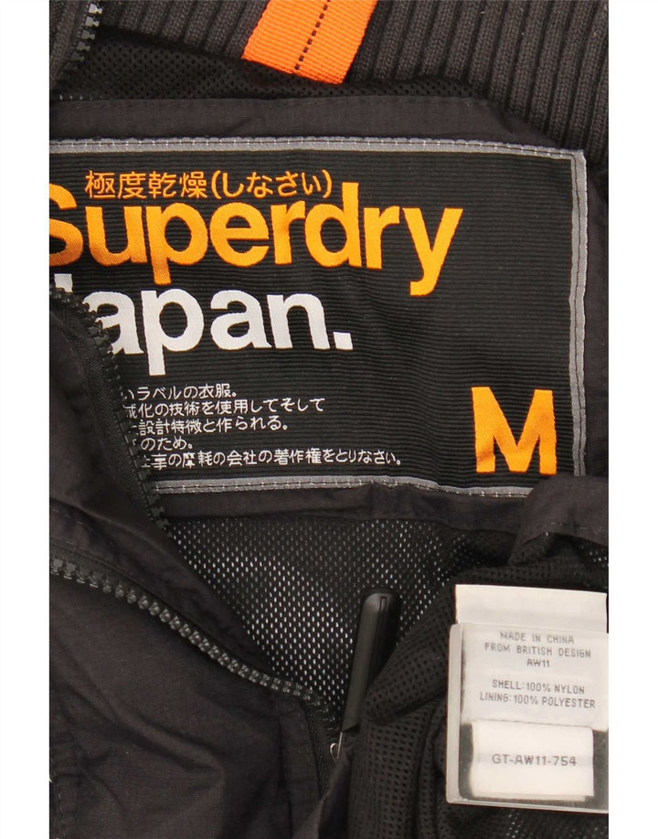 Superdry Veste de pluie graphique pour femme UK 14 Medium Black Nylon