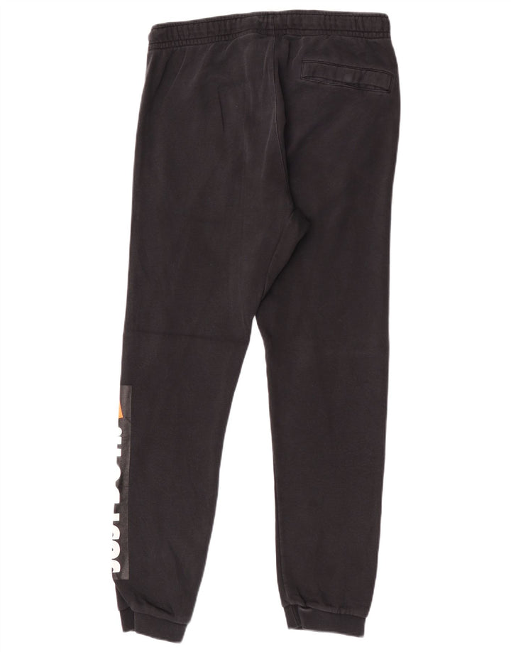 Nike Pantalon de survêtement graphique pour homme en coton noir moyen