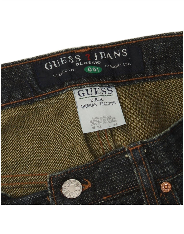 Guess Jean droit coupe classique homme W34 L34 bleu marine coton