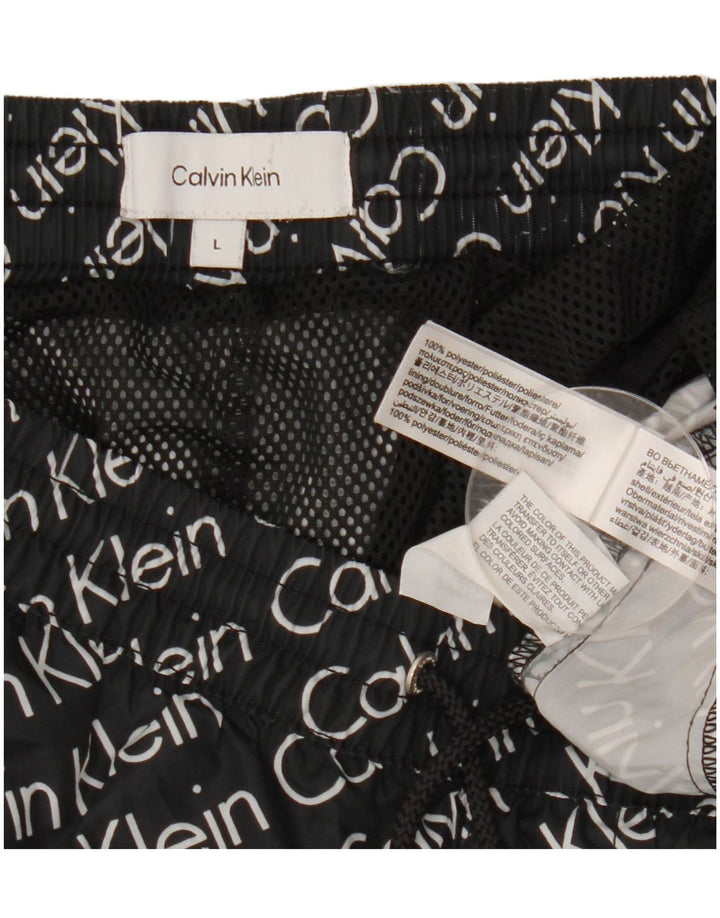 Calvin Klein Short de bain graphique pour hommes, grand, noir, polyester