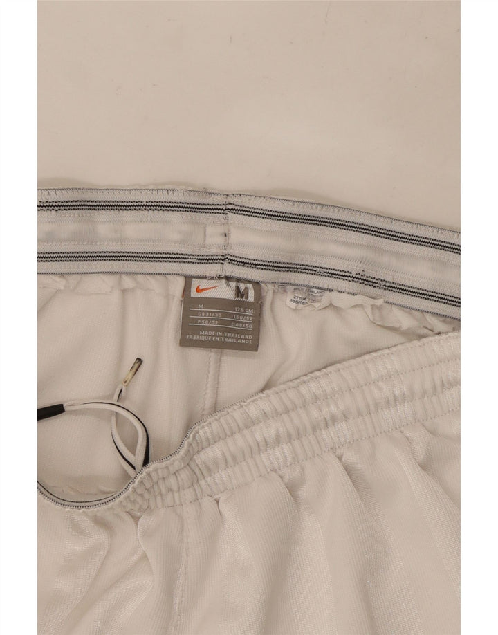 NIKE Short de sport à rayures blanches pour homme