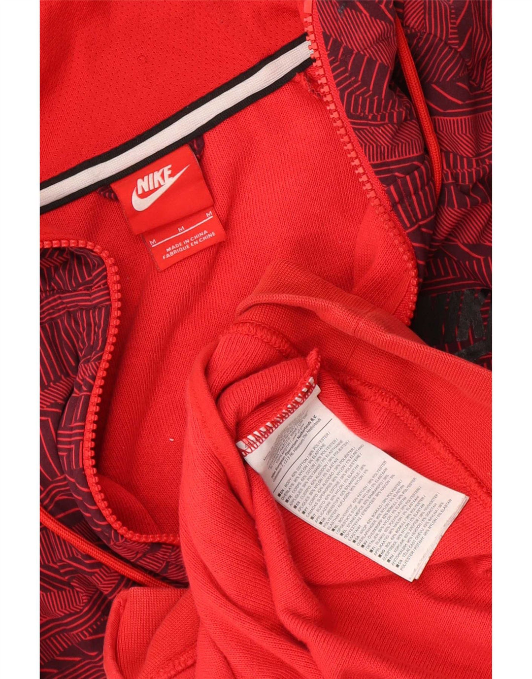 Nike Pull à capuche zippé en coton géométrique rouge moyen pour homme
