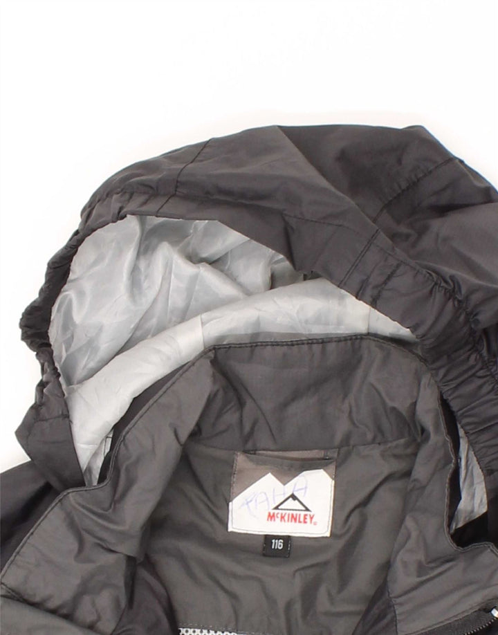 MCKINLEY Boys Hooded Rain Jacket 5-6 Years Black Colourblock Polyamide Vintage McKinley and Second-Hand McKinley from Messina Hembry 