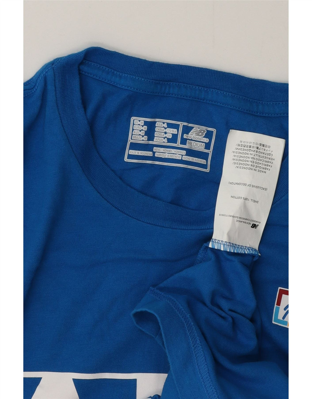 NEW BALANCE T-Shirt Graphique Homme Bleu Moyen Coton
