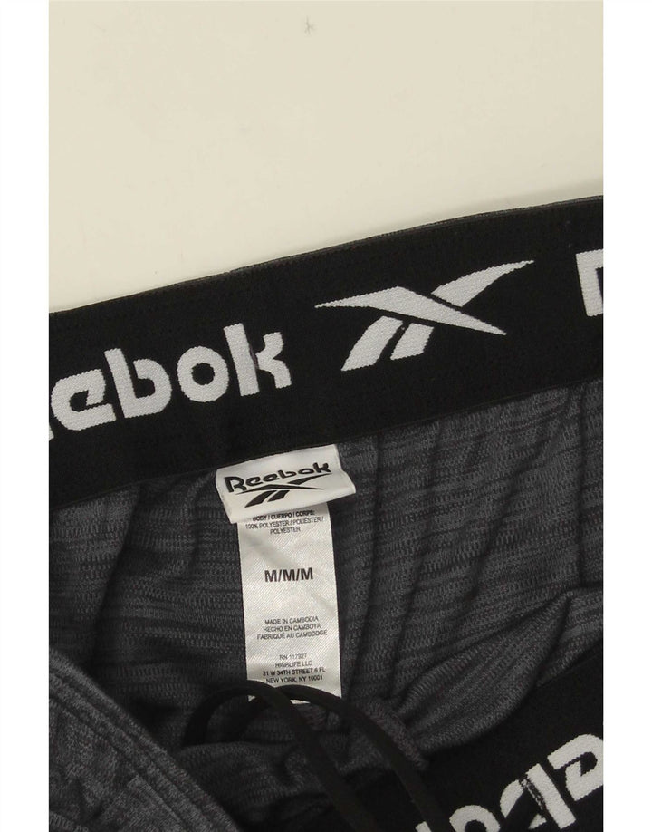 Reebok Short de Sport Homme Gris Moyen Polyester