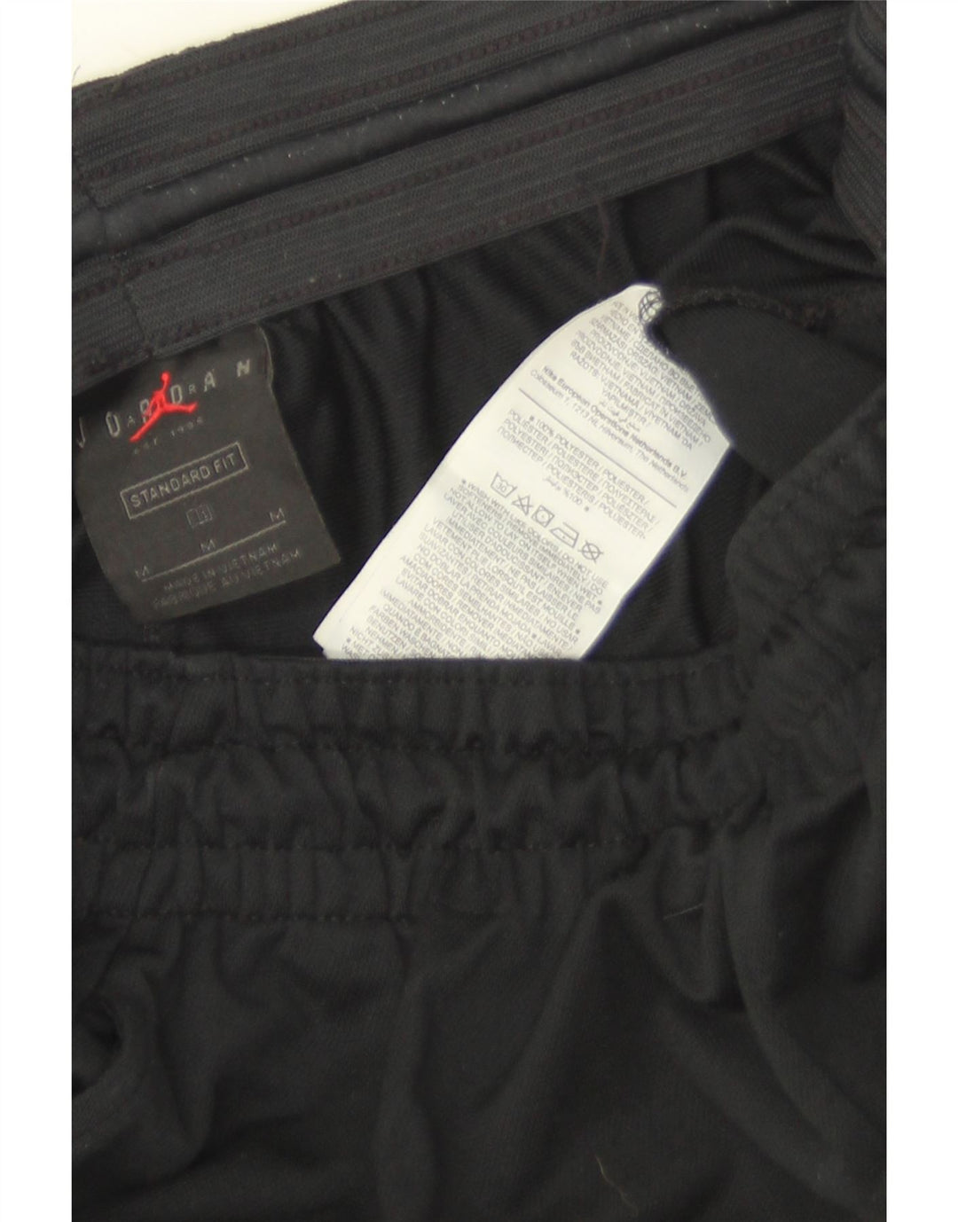Jordan Pantalon de survêtement coupe standard pour homme Noir moyen Colourblock