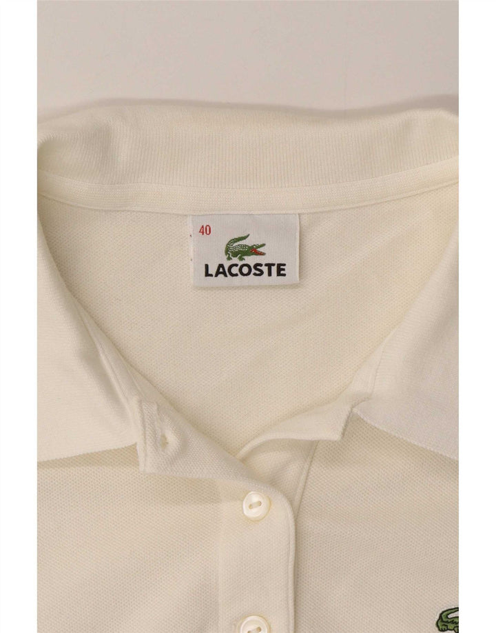 Lacoste Polo à manches longues femme taille 40 coton blanc moyen