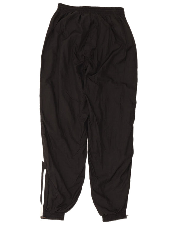 Puma Pantalon de survêtement pour femme Joggers UK 12 Medium Noir Colourblock
