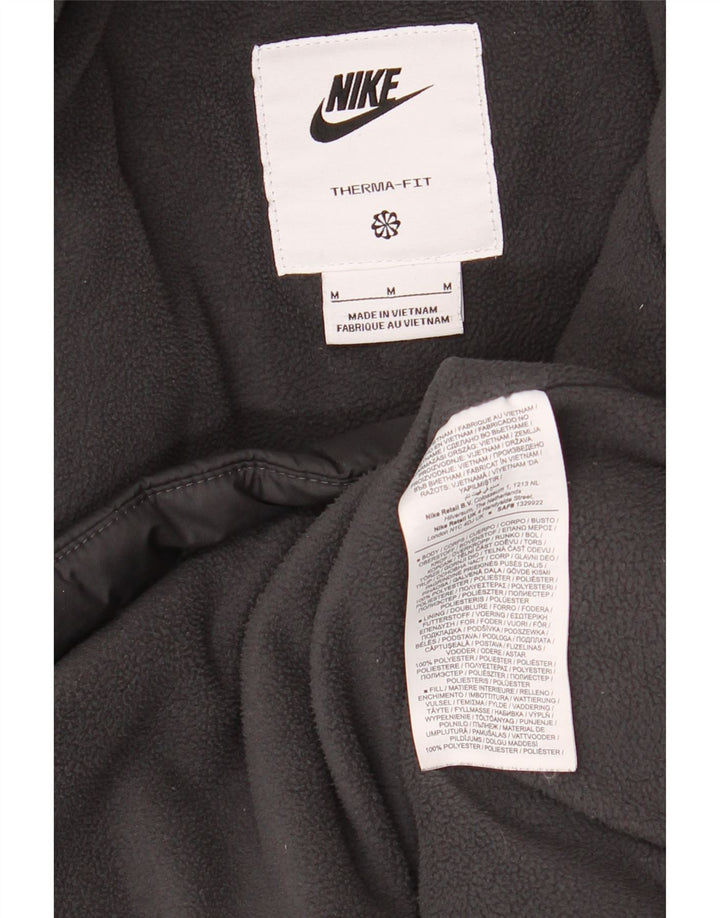 Nike Veste matelassée à capuche Therma-Fit pour homme UK 38 Noir Moyen Polyester