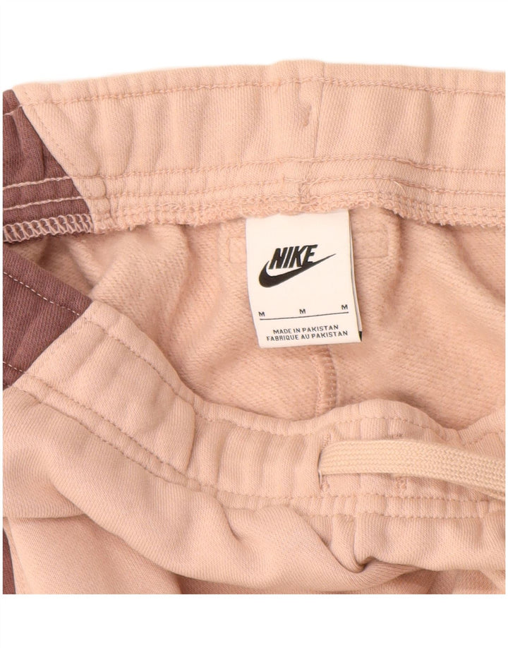 NIKE Pantalon de survêtement pour femme Joggers UK 12 Rose moyen Colourblock