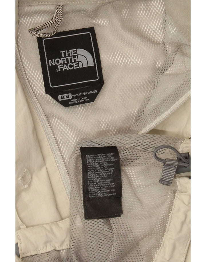 The North Face Veste de pluie à capuche pour femme UK 14 Nylon beige moyen