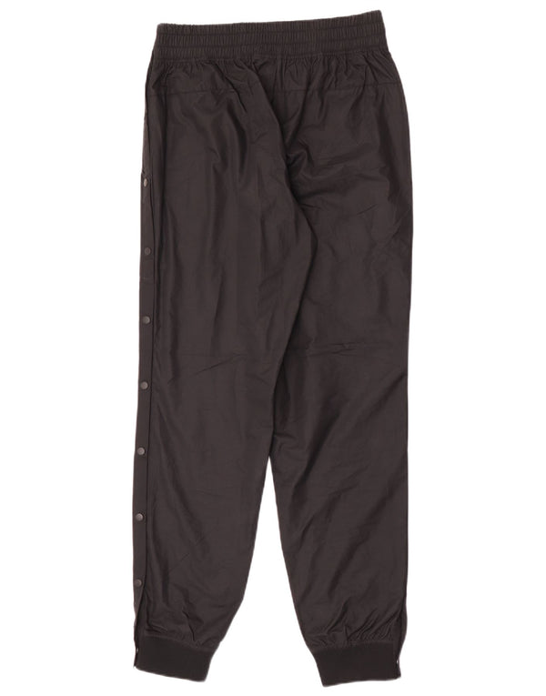 Nike Pantalon de jogging imperméable pour femme UK 12 Medium Noir Polyester