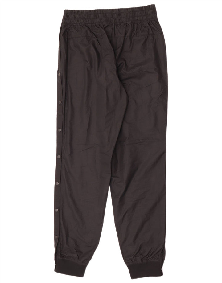 Nike Pantalon de jogging imperméable pour femme UK 12 Medium Noir Polyester