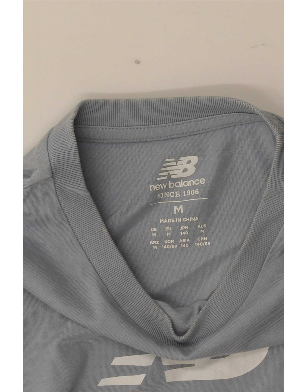 New Balance T-Shirt Graphique Garçon 9-10 ans Bleu Moyen