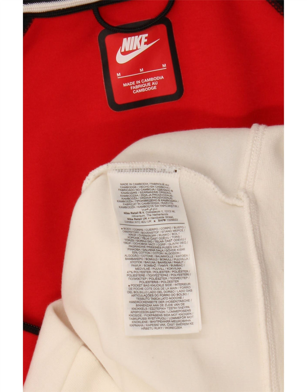 Nike Pull à capuche zippé en coton color block multicolore moyen pour homme