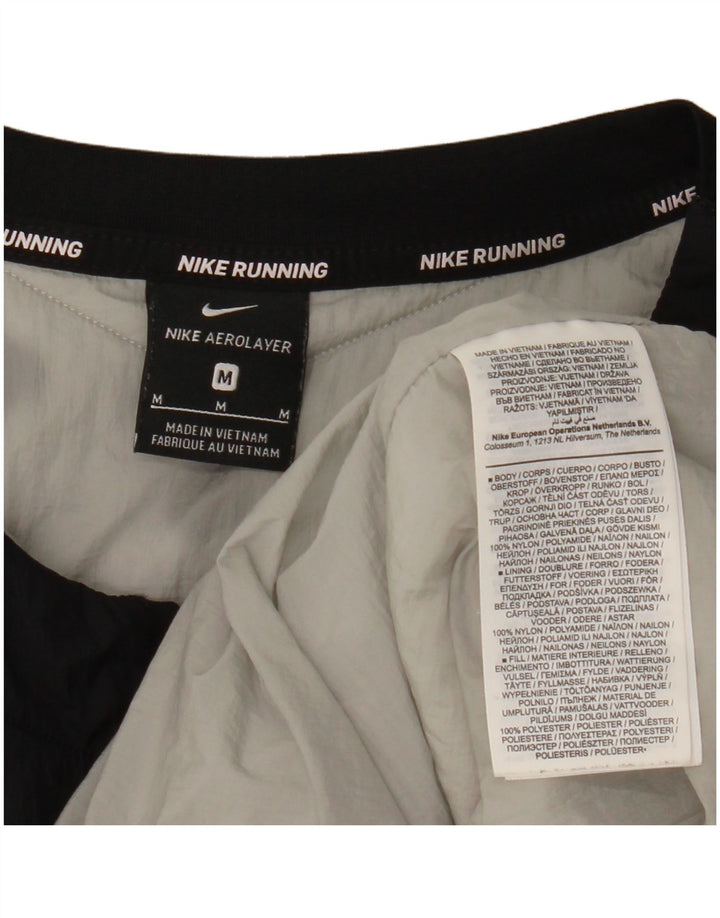 Nike Gilet rembourré pour femme UK 14 Medium Noir Nylon