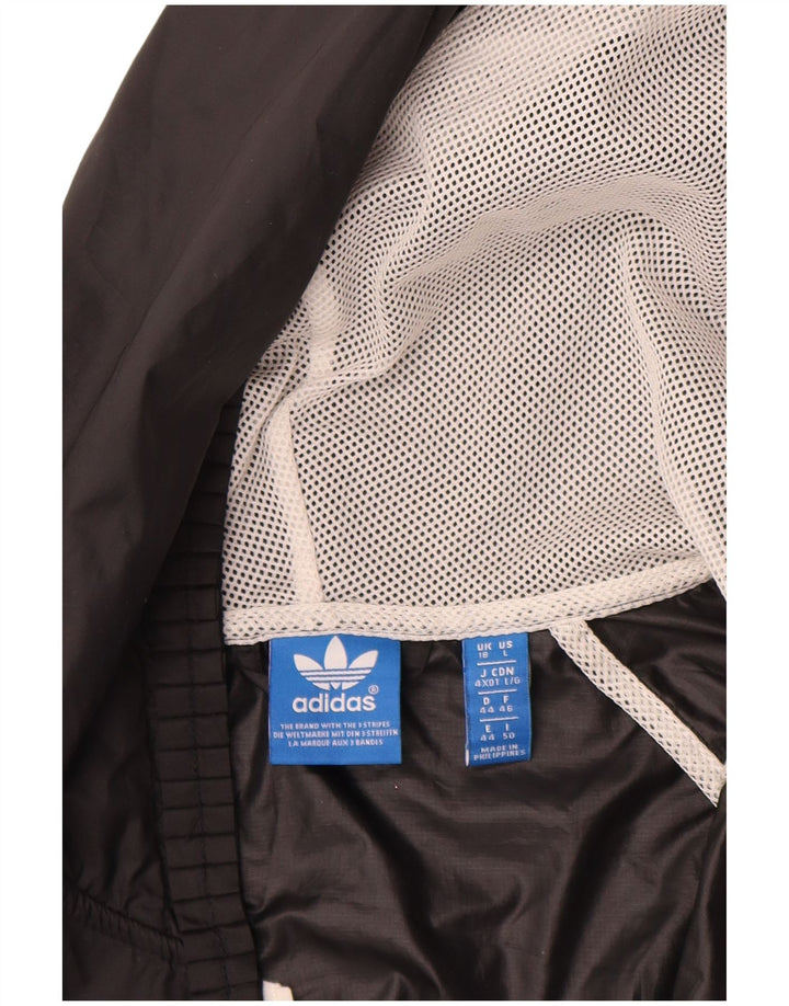 Adidas Veste de pluie à capuche pour femme UK 18 XL Noir Polyester