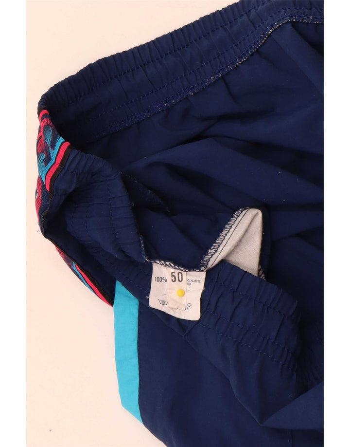 Asics Pantalon De Survêtement Graphique IT 50 Homme Bleu Marine Moyen Colourblock