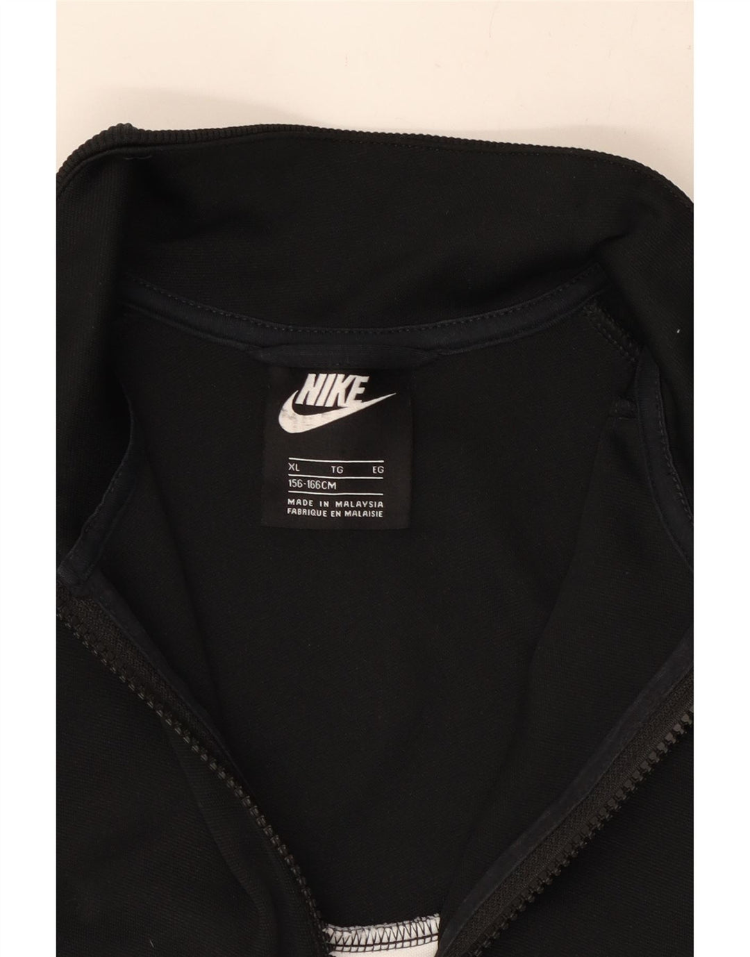 NIKE Girls Tracksuit Top Jacket 13-14 Years XL Black Colourblock Vintage Nike and Second-Hand Nike from Messina Hembry 