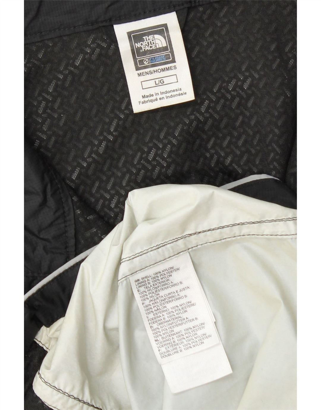 The North Face Veste de survêtement coupe-vent pour homme Taille L Noir Colorblock