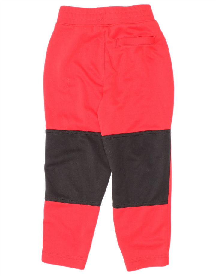 Nike Pantalon de survêtement graphique pour garçon 3-4 ans Rouge Colourblock