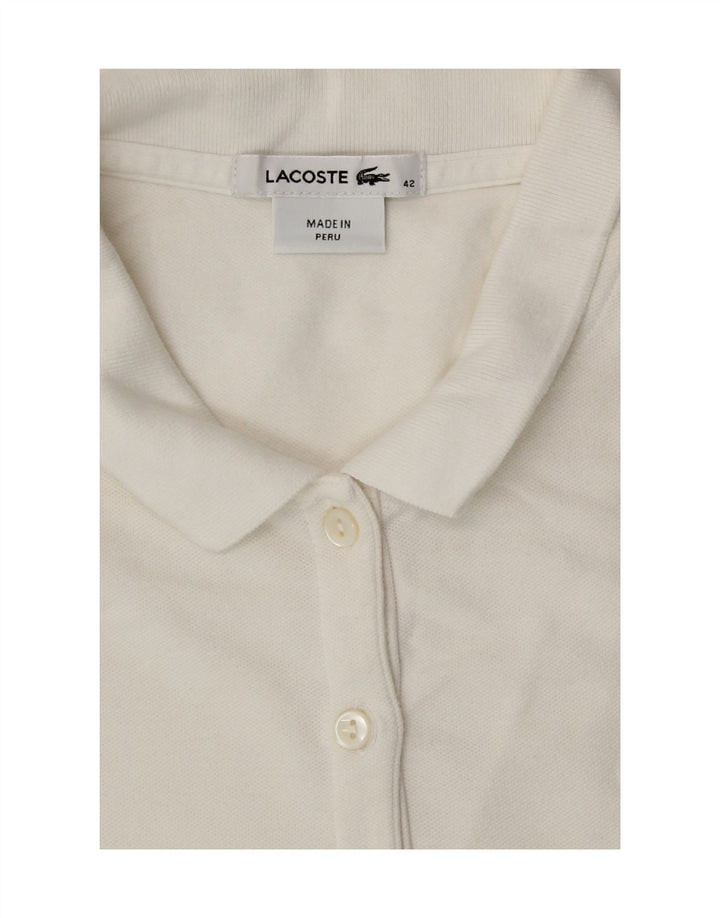 Lacoste Polo sans manches pour femme Taille 42 Grand Blanc