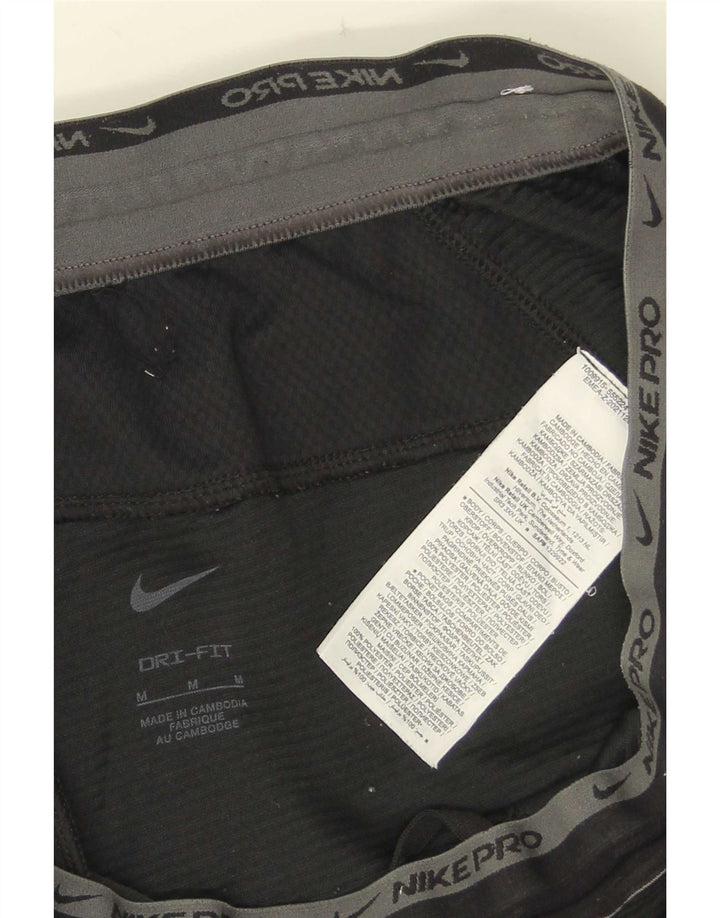 Pantalon de survêtement Nike Dri Fit Graphic pour homme, en polyester noir moyen