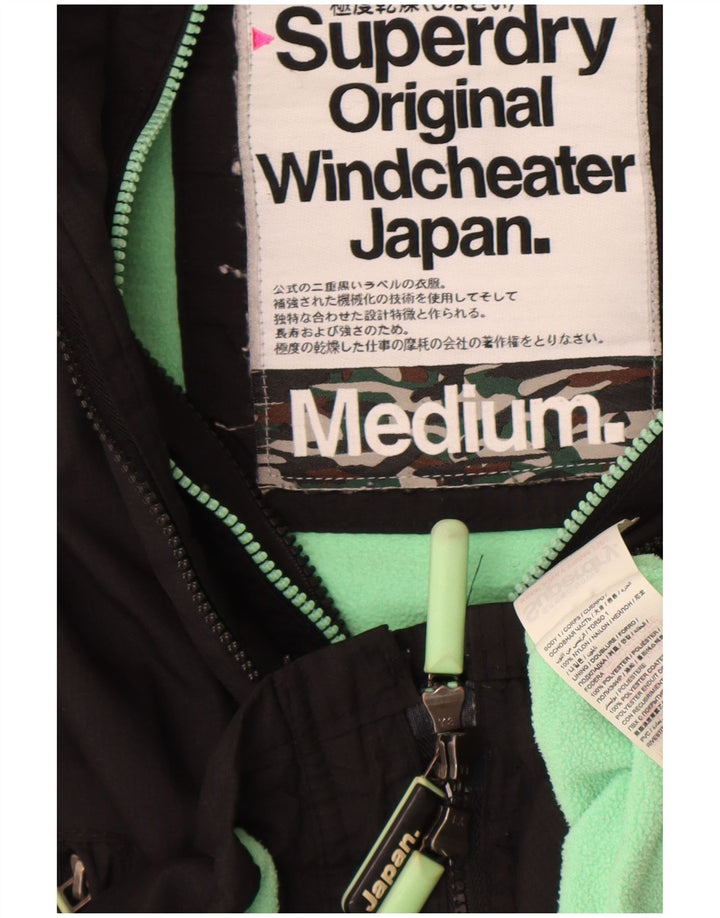 Superdry Veste coupe-vent à capuche Windcheater pour femme UK 14 Medium Noir