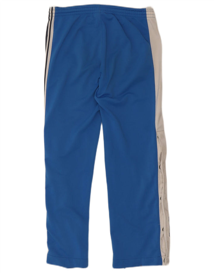NIKE Pantalon de survêtement graphique garçon 10-11 ans Bleu moyen colour block