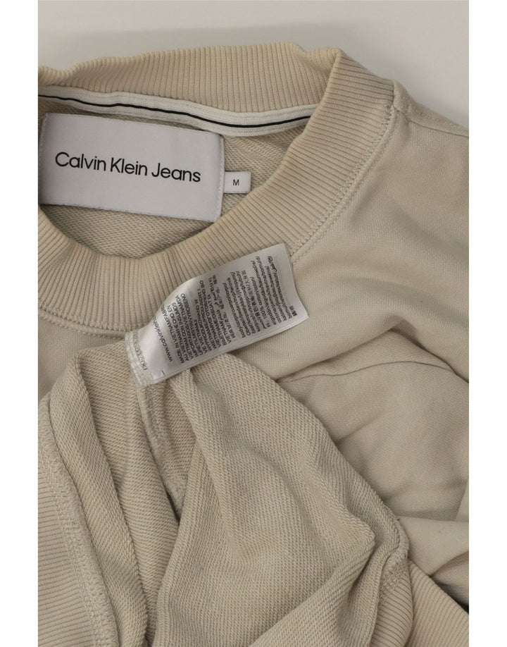 Calvin Klein Jeans Sweat-shirt graphique pour homme en coton blanc cassé moyen