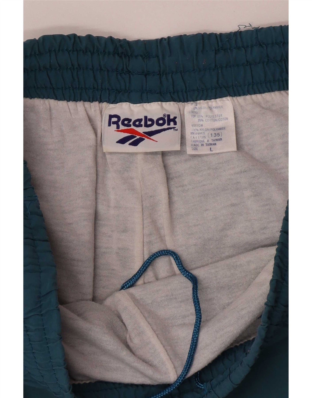 Reebok Pantalon de Survêtement Joggers Homme Bleu Nylon Large