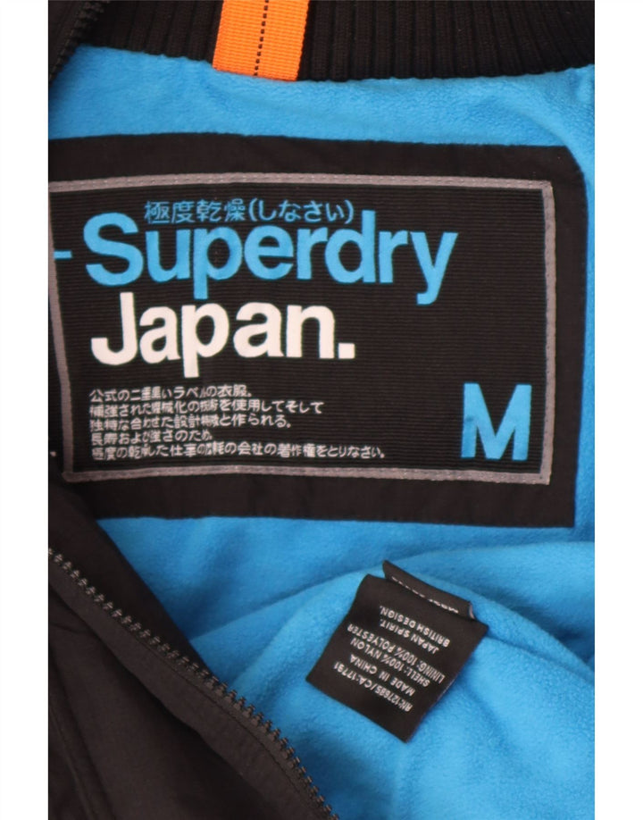 Superdry Veste coupe-vent à capuche pour femme UK 14 Medium Black Nylon
