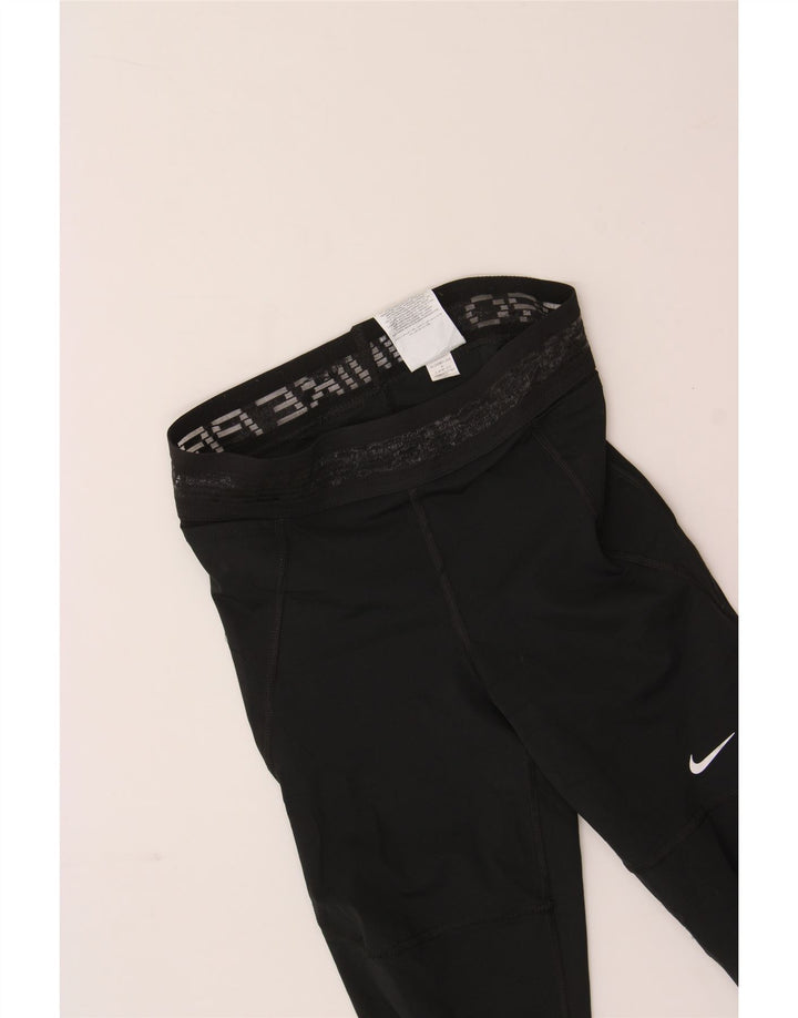 NIKE Womens Graphic Tracksuit Trousers UK 10 Small Black Polyester Vintage Nike and Second-Hand Nike from Messina Hembry 