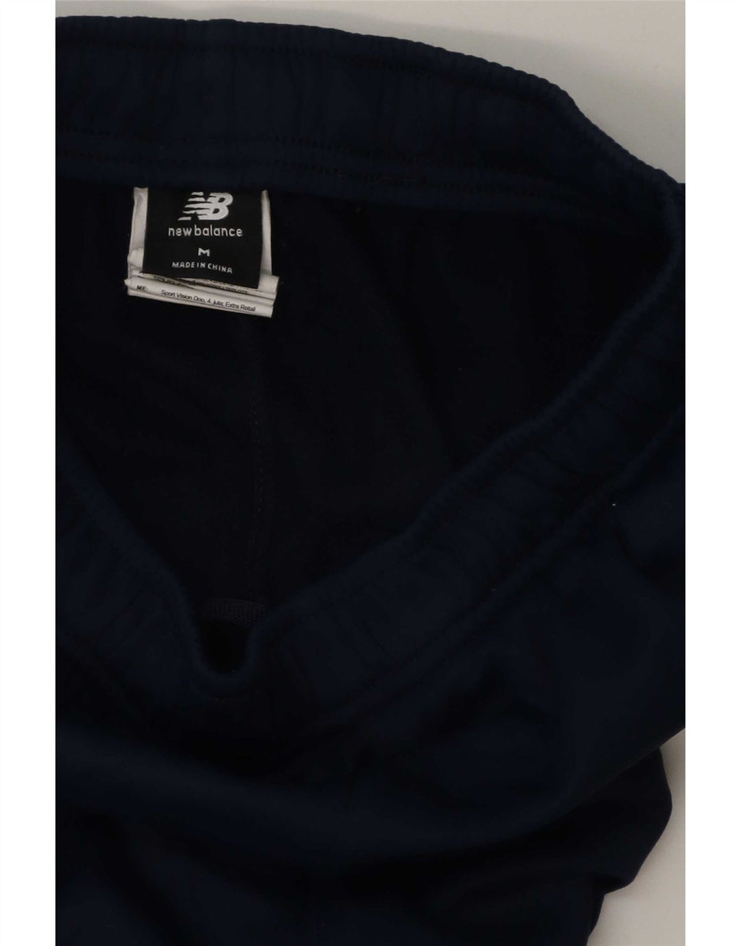 New Balance Pantalon de Survêtement Graphique Homme Bleu Marine Moyen Polyester