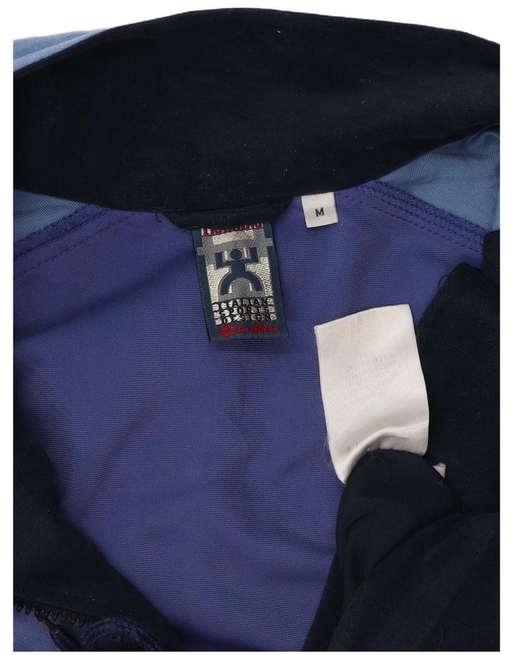 Lotto Survêtement Complet en Velours Homme Bleu Marine Moyen Polyester Colorblock
